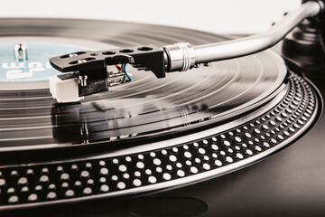 Playing a vinyl record on a turntable