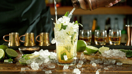 Poster - Preparation of mojito drink on bar counter.