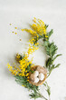 © ADDICTIVE STOCK - Easter card concept with yellow mimosa flowers