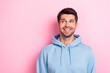 © deagreez - Portrait of joyful nice man wear fashionable clothes interested look empty space special deal low prices isolated on pink color background