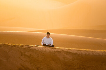 Sticker - person sitting in desert