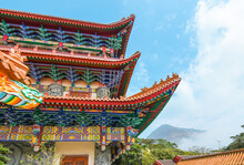 Colorful Chinese Temple Roof With Blue Sky Background, Hong Kong.