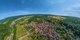 Fototapeta  - Die kleine Gemeinde Gamburg im Taubertal, überragt von der imposanten Höhenburganlage
