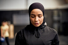 Muslim Woman Resting During A Gym Class