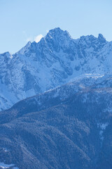 Sticker - The Valtellina mountains, with its pastures, woods and fresh snow, during a wonderful winter day near the village of Sondrio, Italy - January 2023.