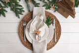 Fototapeta Kawa jest smaczna - Beautiful festive place setting with stylish decor for Christmas dinner on white wooden table, flat lay
