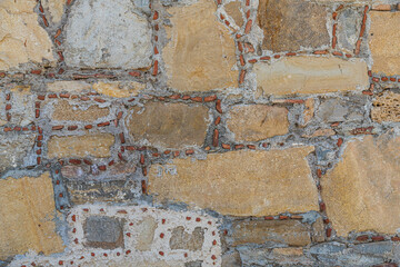 Sticker - The texture of the stone wall. Background texture of the stone wall of the old castle.