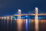 Fototapeta Nowy Jork - Bridge between the islands at night time. Macau.