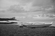 Hawaiian Outrigger Canoe On The Beach In Hawaii.