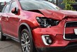 © Banana Photography - A car showing auto panel and headlight damage for repair from a front end crash.