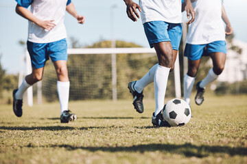 Canvas Print - Sports, running and men with a football on a field for training, competition and professional game. Teamwork, exercise and soccer players at a park for cardio, fitness action and workout in Brazil