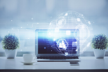 Poster - Computer on desktop with social network hologram. Double exposure. Concept of international people connections.