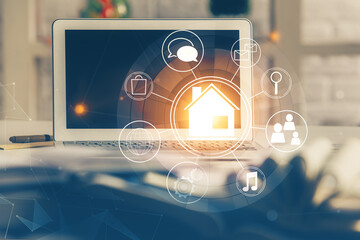 Poster - Desktop computer background in office and big town buildings hologram drawing. Double exposure. Smart city concept.