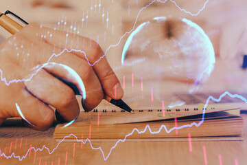 Poster - Double exposure of man doing notes of stock market with forex graph.
