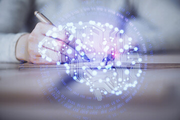 Aufkleber - Double exposure of woman's writing hand on background with brain hud. Concept of learning.
