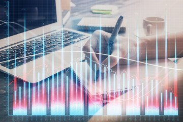 Poster - Forex chart displayed on woman's hand taking notes background. Concept of research. Multi exposure