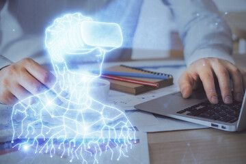 Poster - AR hologram with man working on computer on background. Augmented reality concept. Double exposure.