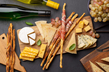 Wall Mural - Antipasto board with various cheese and snacks