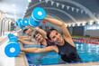© zinkevych - Group of seniors having an exercise with dumbbels during water aerobics class