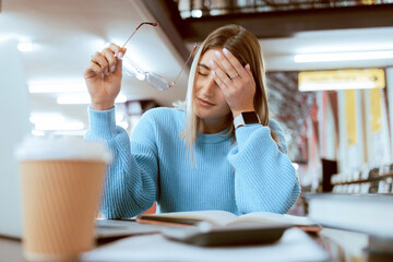 Poster - Woman student, tired with headache and university burnout, stress about paper deadline or study for exam in library. Campus, college studying fatigue with scholarship problem, pain and mental health