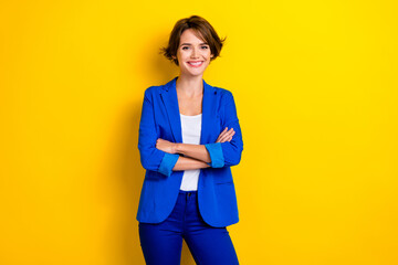 Sticker - Photo cadre of young business lady crossed hands wear blue jacket ukraine concept confident person expert worker isolated on yellow color background