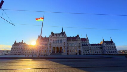 Sticker - Parliament at sunset with riding tram in foreground, Budapest, Hungary