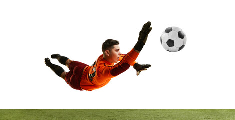 Dynamic portrait of professional soccer goalkeeper jumping and catching football ball isolated over white background. Concept of sport, action, motion, goals.