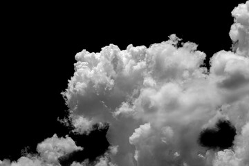 Wall Mural - Separate white clouds on a black background have real clouds. White cloud isolated on a black background realistic cloud. white fluffy cumulus cloud isolated cutout on black background