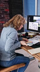 Aufkleber - Side View Of Real Estate Designer Working On Computer