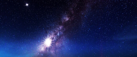 Wall Mural - space galaxy background.panorama purple and blue night sky milky way and star on dark background.wit
