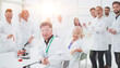 © ASDF - group of researchers at the workplace in the laboratory.