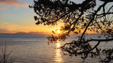 Fototapeta Na ścianę - approaching sunset on the Strait of Georgia or Salish Sea looking to Vancouver Island from Lighthouse Park in West Vancouver travel and tourism