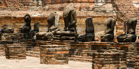 Buddhas and temple ruins in Ayutthaya in Thailand