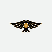 Vector Illustration Of Two Birds And A Shield For An Icon, Symbol Or Logo. Eagle Or Phoenix Flat Logo