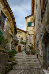 Wall Mural - An old atmospheric city with narrow and cramped quiet streets and stairs