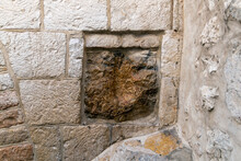An Imprint Of A Human Hand In Stone Along The Via Dolorosa In Jerusalem, Israel, Where Jesus Stumbled And Steadied Himself While Carrying The Cross. 