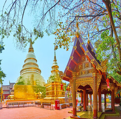 Canvas Print - Golden Phra That Luang Chedi and shrines of Wat Phra Singh, Chiang Mai, Thailand