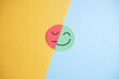 Happy smiley face hiding or behind sad face, change emotion bipolar and depression, mental health concept, personality, mood change, therapy healing split concept...
