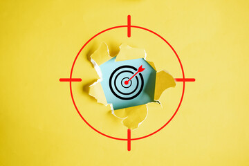 Aufkleber - Dartboard with arrow hiding of yellow punched paper, Aiming target of business for planning business objective target to successful development, innovation, idea, creative.