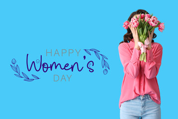 Wall Mural - Young woman with bouquet of pink tulips on blue background. International Women's Day