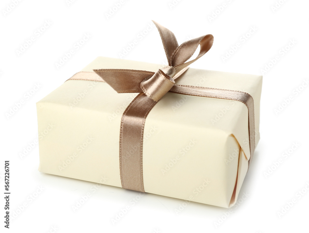 Gift box with bow on white background. International Women's Day celebration