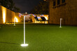 © Jason Yoder - Nighttime image of a personal home putting green with illuminated holes.