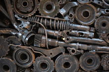 Texture Metal Junk Nuts Bolts Wires And Other Spare Parts Piled In A Mix Of Metal Debris With Gears And Rust Abstract Image