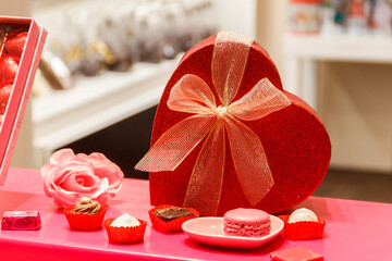 Wall Mural - Heart shaped gift box on a store display. Valentine Day concept