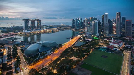 Wall Mural - Singapore Skyline and view of skyscrapers on Marina Bay, Time lapse from night to day