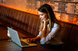Portrait of beautiful business woman working on laptop. Business work online concept.