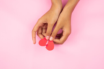 Poster - Hands holding papers heartbreak symbol