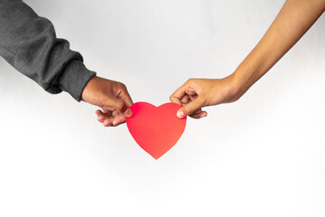 Poster - Women and men hands holding hearts together