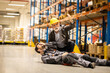 © Nemanja - Warehouse worker got injured, broke his leg, senior manager is helping him out