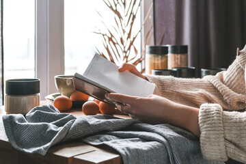 girl is preparing food dinner in the kitchen of her cozy home.home cooking, at home dining Slow cooking, comfort, mood. Slow moments of life, wellness and self love